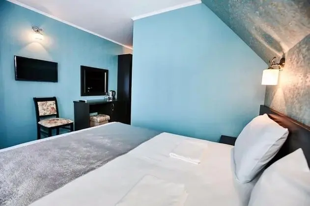 Deluxe Tek Büyük veya İki Ayrı Yataklı Oda