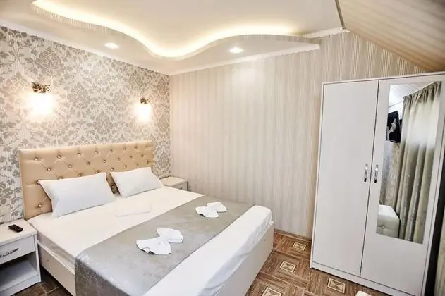 Deluxe Tek Büyük veya İki Ayrı Yataklı Oda