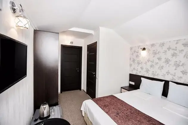 Deluxe Tek Büyük veya İki Ayrı Yataklı Oda