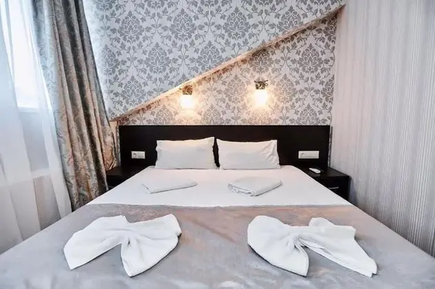 Deluxe Tek Büyük veya İki Ayrı Yataklı Oda