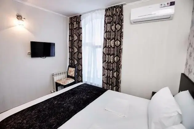 Deluxe Tek Büyük veya İki Ayrı Yataklı Oda