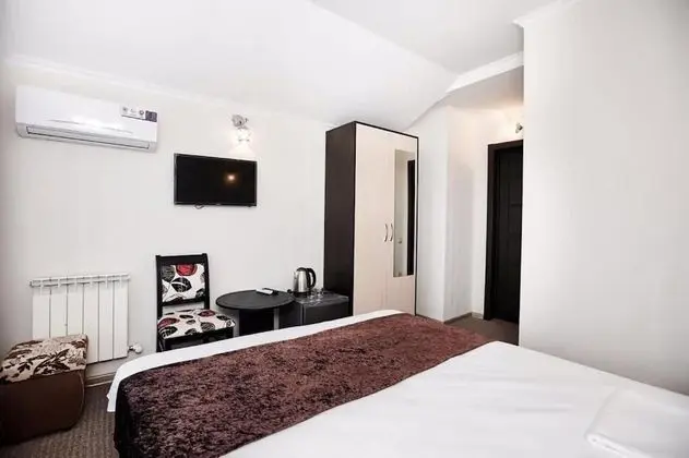 Deluxe Tek Büyük veya İki Ayrı Yataklı Oda