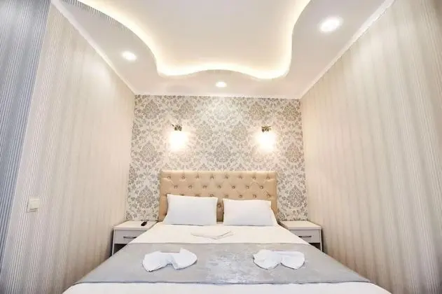 Deluxe Tek Büyük veya İki Ayrı Yataklı Oda