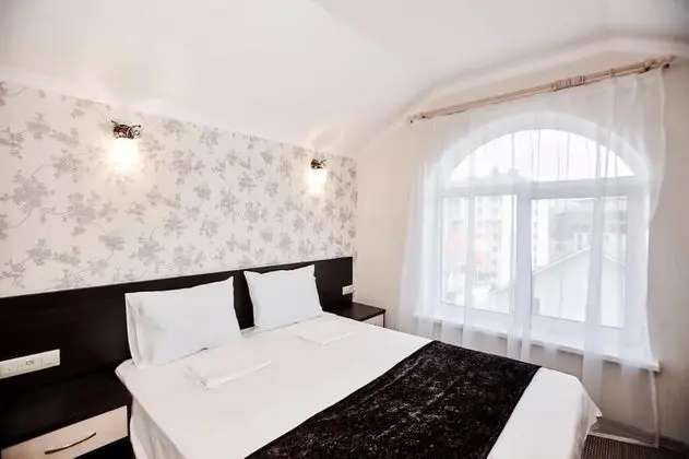 Deluxe Tek Büyük veya İki Ayrı Yataklı Oda