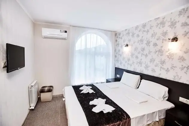 Deluxe Tek Büyük veya İki Ayrı Yataklı Oda