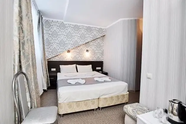 Deluxe Tek Büyük veya İki Ayrı Yataklı Oda