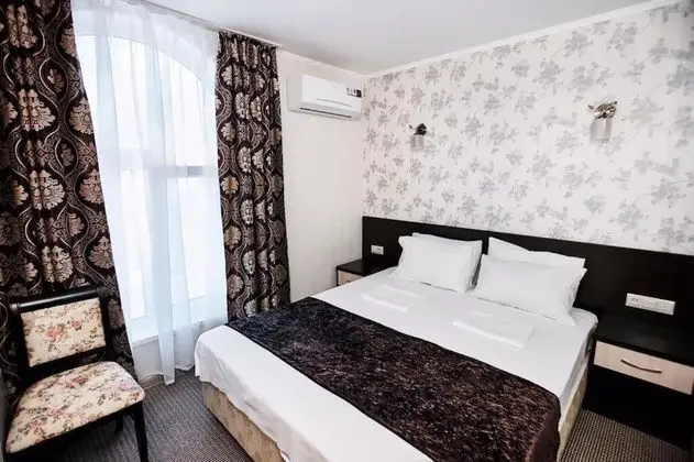 Deluxe Tek Büyük veya İki Ayrı Yataklı Oda