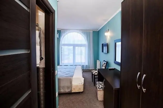 Deluxe Tek Büyük veya İki Ayrı Yataklı Oda