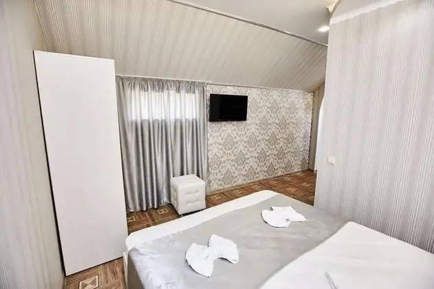 Deluxe Tek Büyük veya İki Ayrı Yataklı Oda