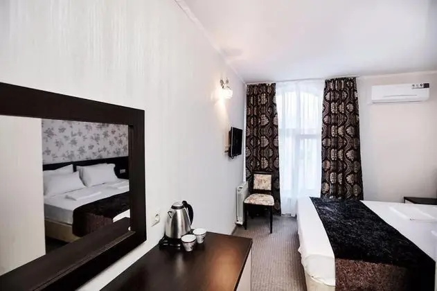 Deluxe Tek Büyük veya İki Ayrı Yataklı Oda