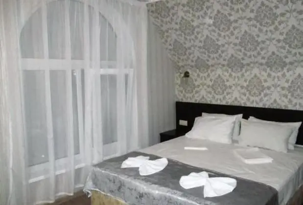 Deluxe Tek Büyük veya İki Ayrı Yataklı Oda