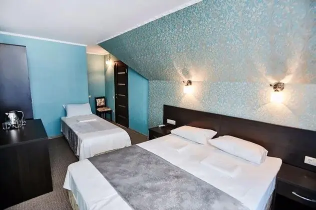 Deluxe Üç Kişilik Oda