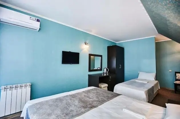 Deluxe Üç Kişilik Oda