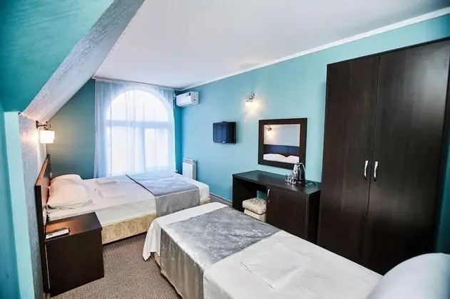 Deluxe Üç Kişilik Oda