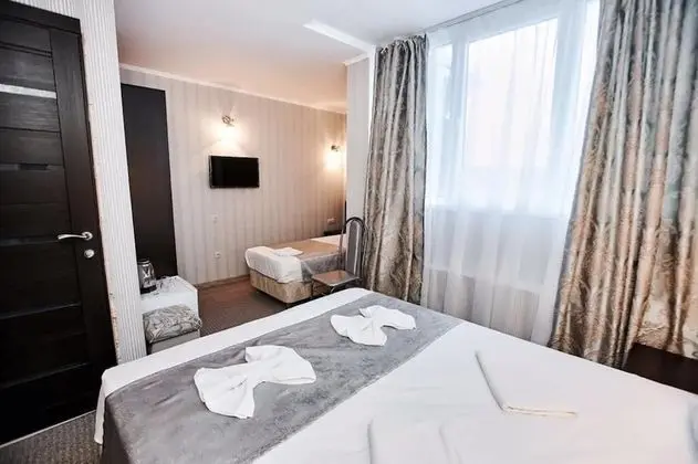 Deluxe Üç Kişilik Oda