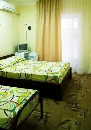 Economy Üç Kişilik Oda, Ortak Banyo