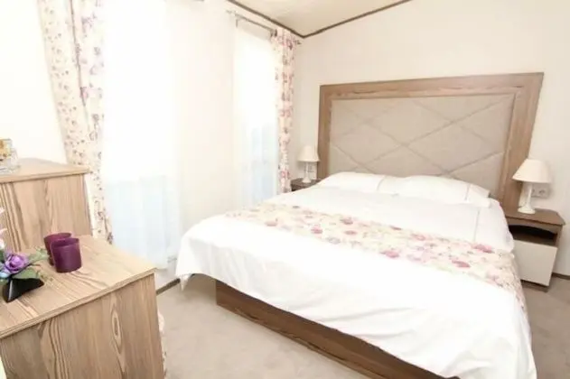 Deluxe Tek Büyük Yataklı Oda, Bahçe Manzaralı